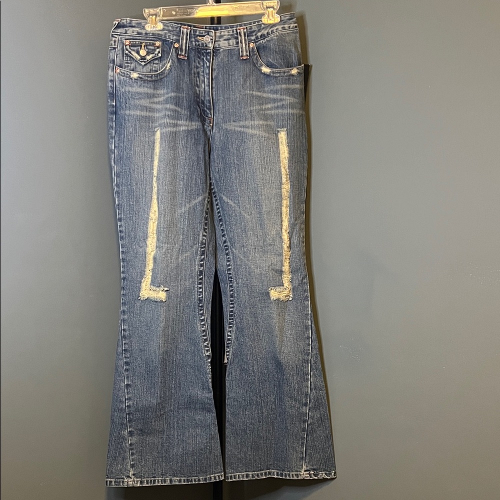 Classic Blue Flare Jeans with Distressed Accents